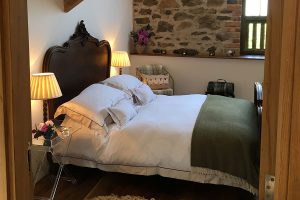 Antique double bed at romantic Bed and Breakfast