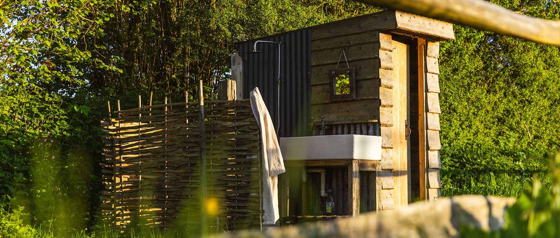 Great Links Yurt outside shower and toilet