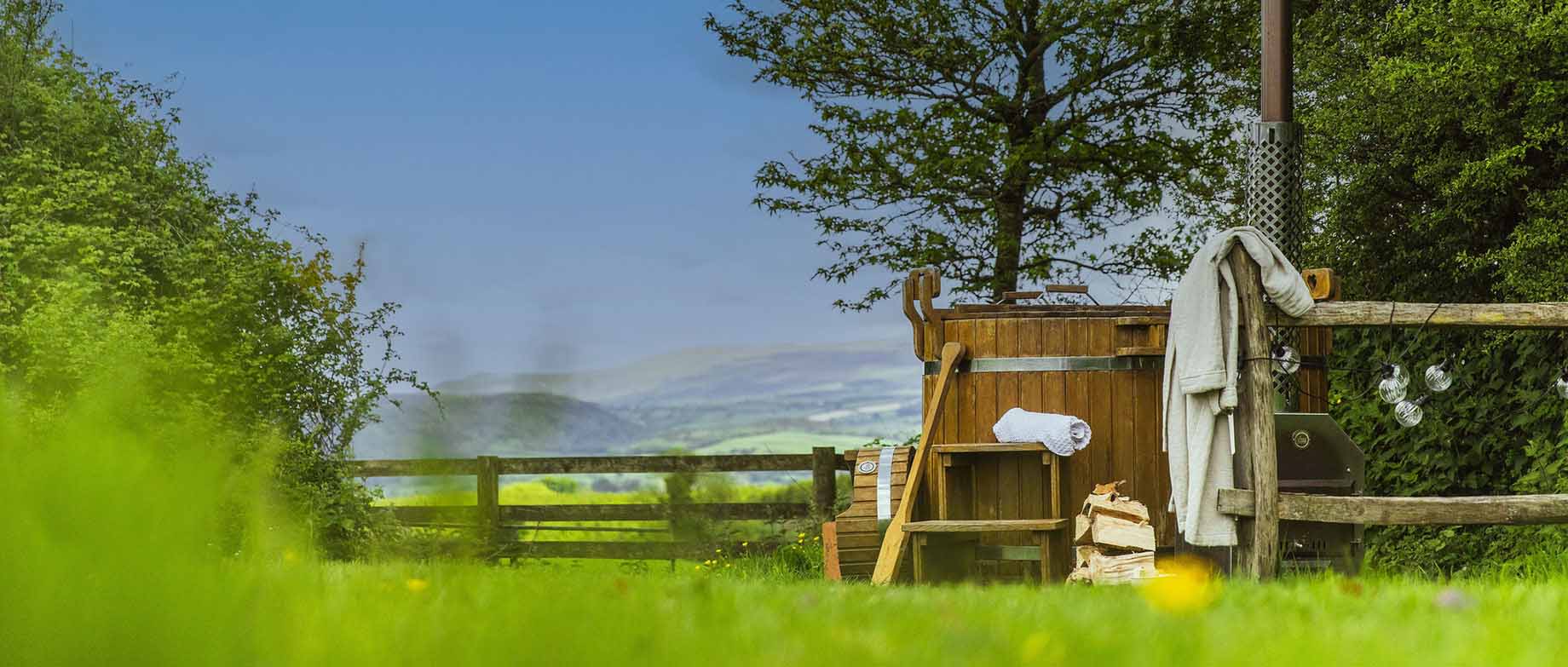 Log-fired hot tub with a view across Dartmoor