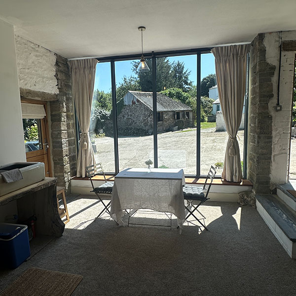View from The Shippon across the sitting area to the courtyard window
