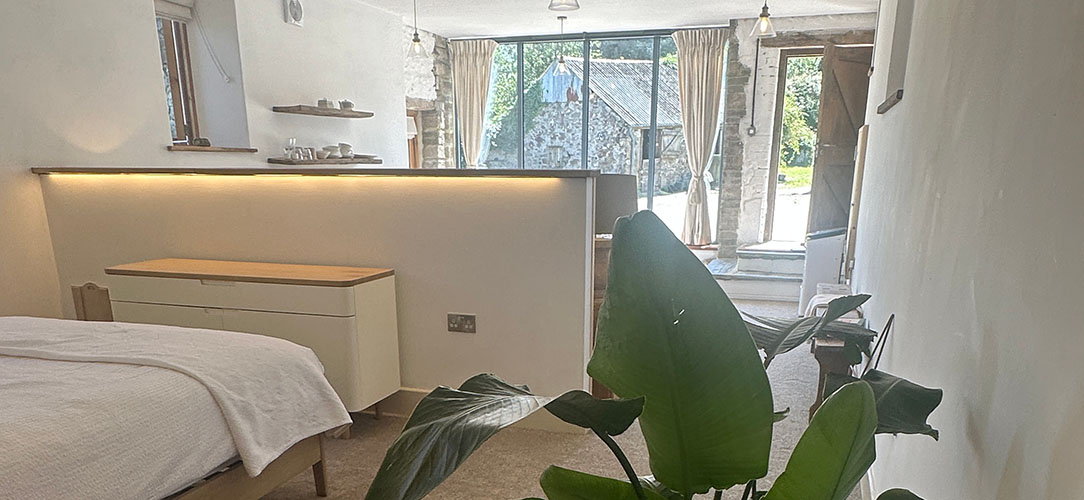 View from The Shippon across the bedroom to the courtyard window